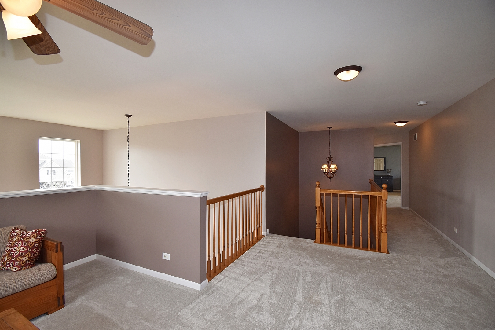 294 Sonora Drive Elgin, IL 60124 - Photo 23 of 40 a view of a livingroom with a projector and furniture