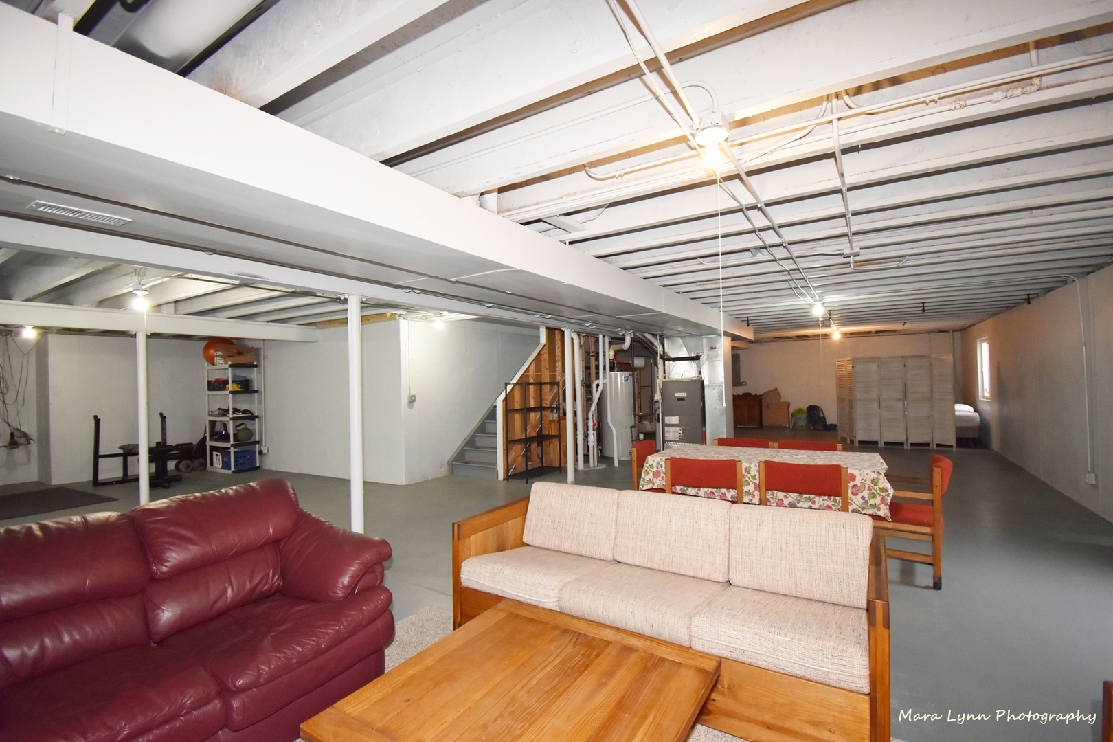 294 Sonora Drive Elgin, IL 60124 - Photo 34 of 40 a living room with furniture and a chandelier