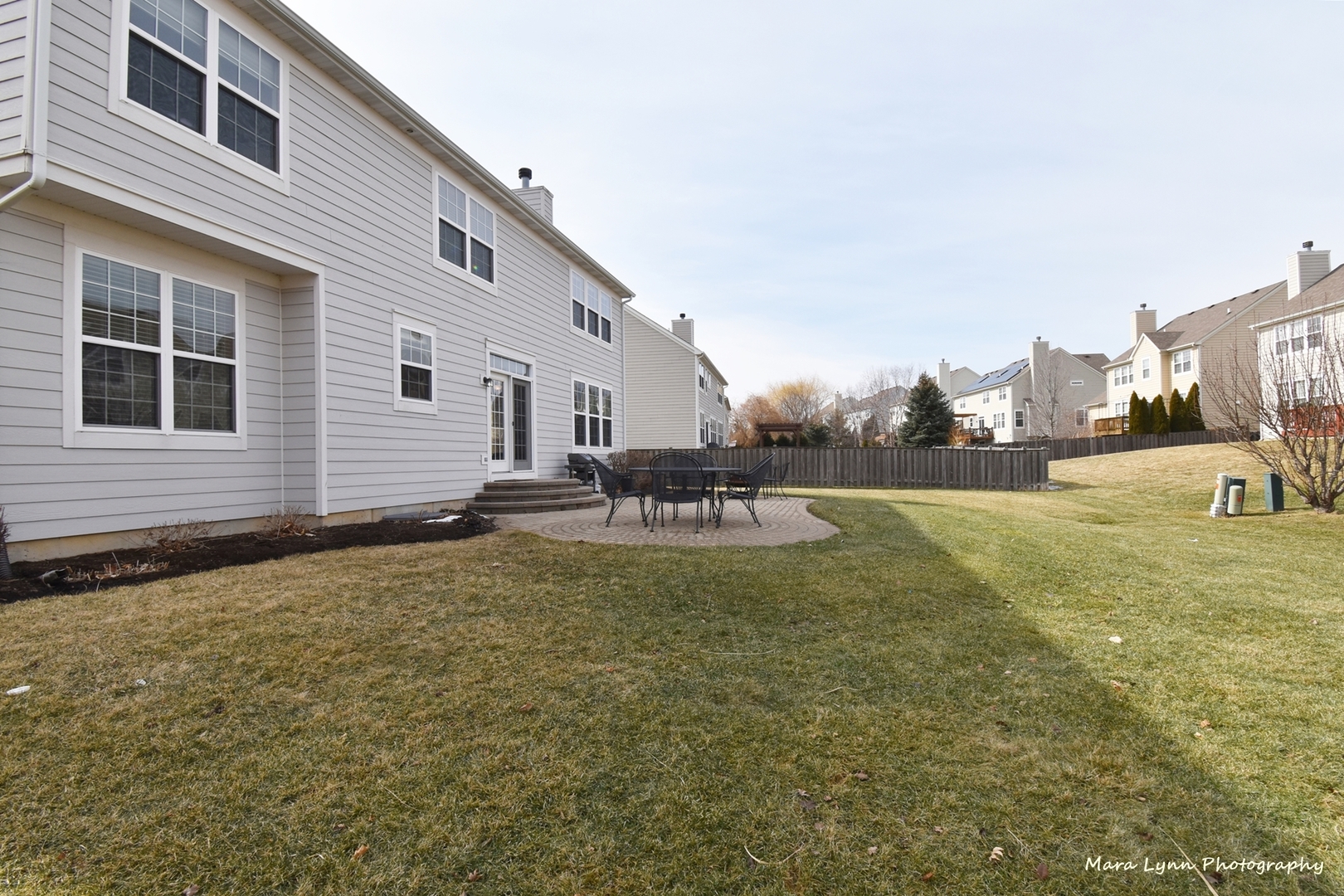 294 Sonora Drive Elgin, IL 60124 - Photo 37 of 40 a backyard of a house with table and chairs