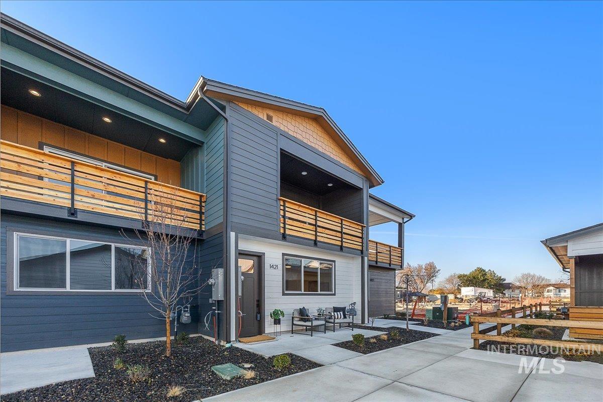 1445 North Bluffs Ridge Lane Boise, ID 83704 - Photo 15 of 47 Rear view of property with a balcony and a patio area