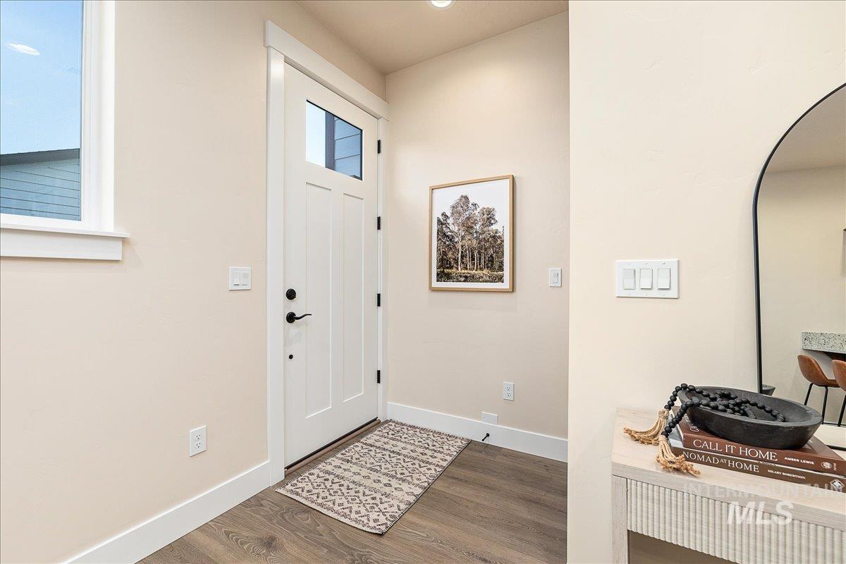 1445 North Bluffs Ridge Lane Boise, ID 83704 - Photo 17 of 47 Entrance foyer with baseboards and wood finished floors