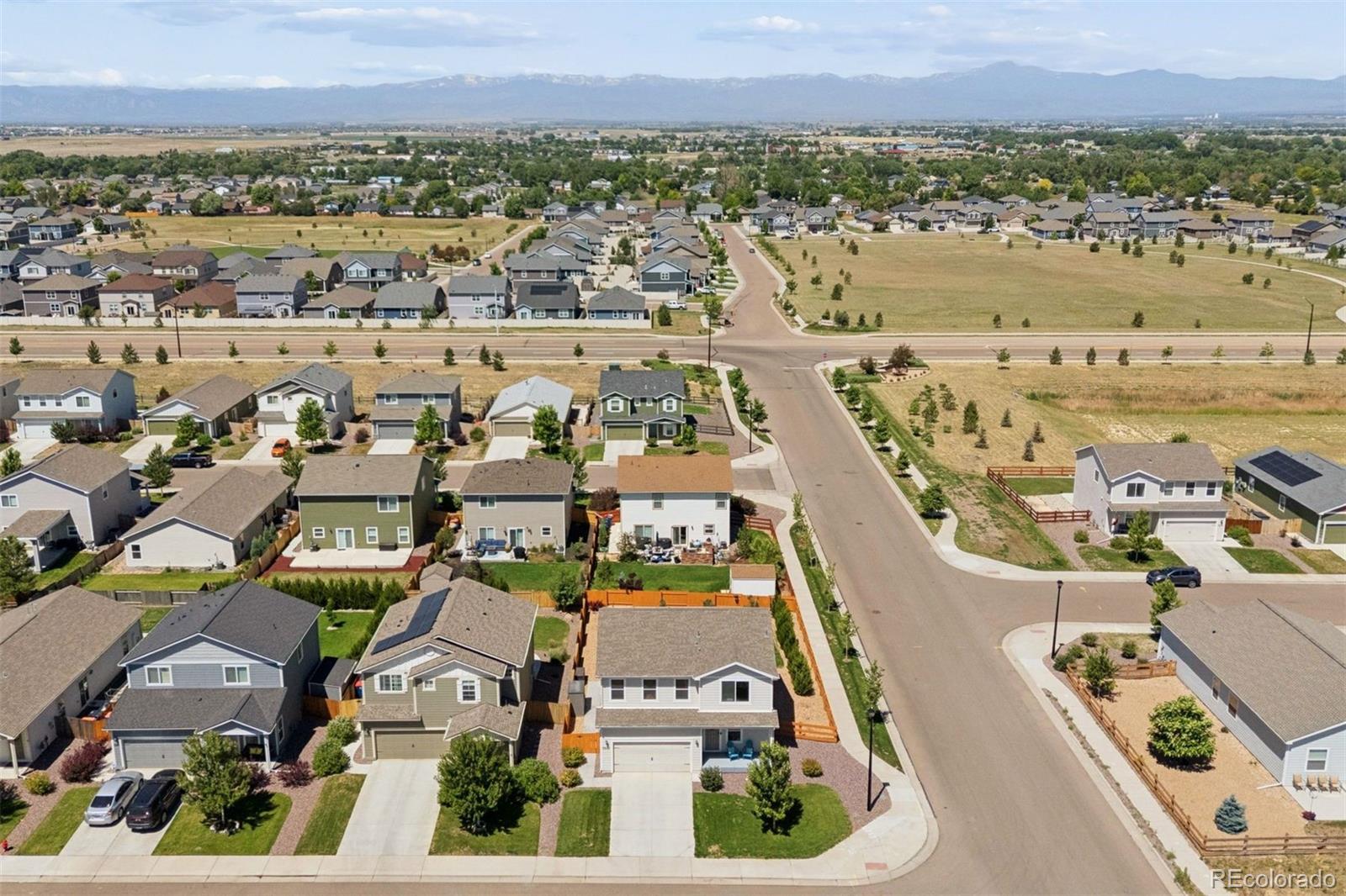 7307 Animas Avenue Frederick, CO 80530 - Photo 43 of 49 an aerial view of residential building and lake