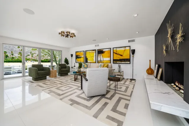 a kitchen with stainless steel appliances a refrigerator and a stove