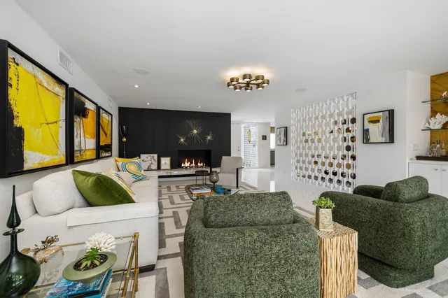 a kitchen with stainless steel appliances granite countertop a stove and a refrigerator