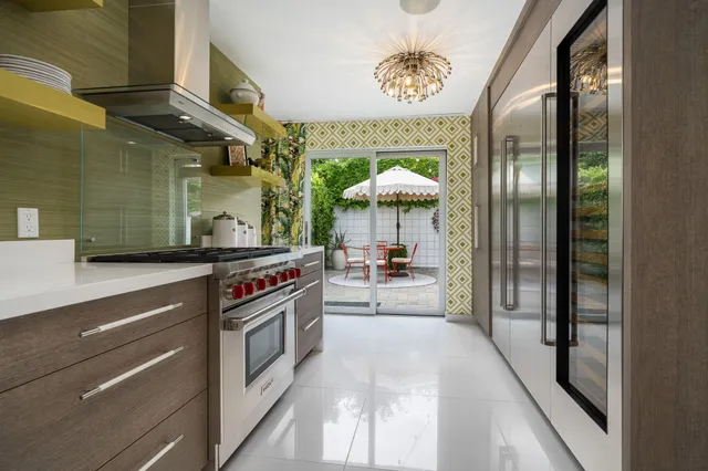 a bathroom with a shower curtain and a sink