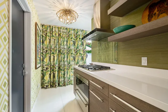 a spacious bedroom with a bed and a couch