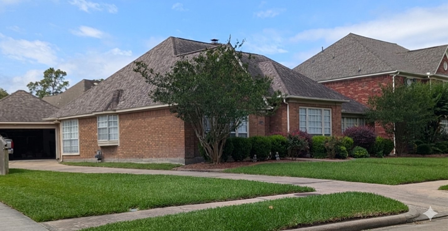 13107 Walnut Lake Road Houston, TX 77065 - Photo 2 of 21 a front view of a house with a garden