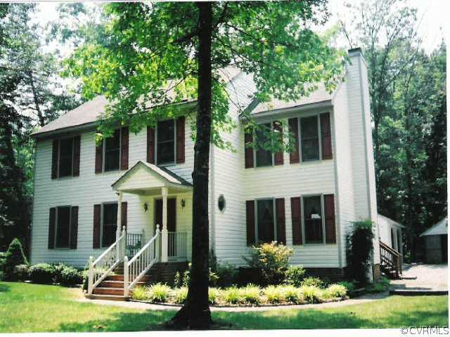 4880 North Courthouse Road Providence Forge, VA 23140 - Photo 1 of 6 a view of a house with backyard and garden