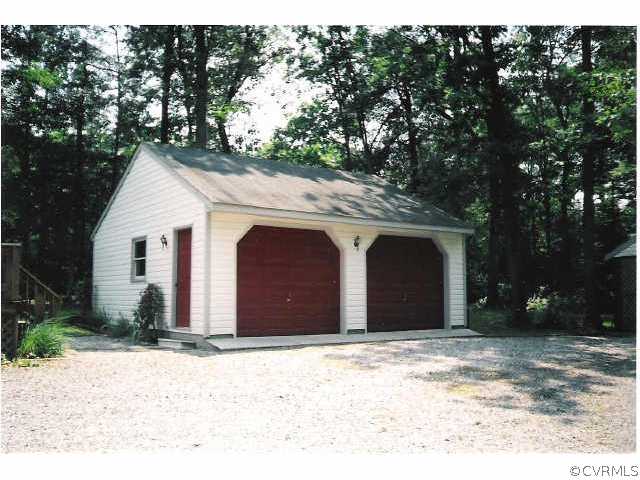 4880 North Courthouse Road Providence Forge, VA 23140 - Photo 3 of 6 a house with a outdoor space