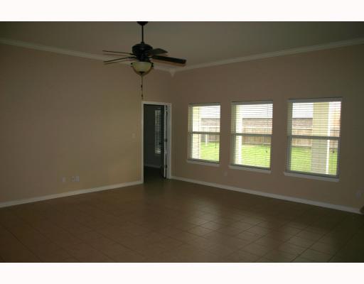 1005 Purdue Road Corpus Christi, TX 78418 - Photo 2 of 10 a view of an empty room with a window