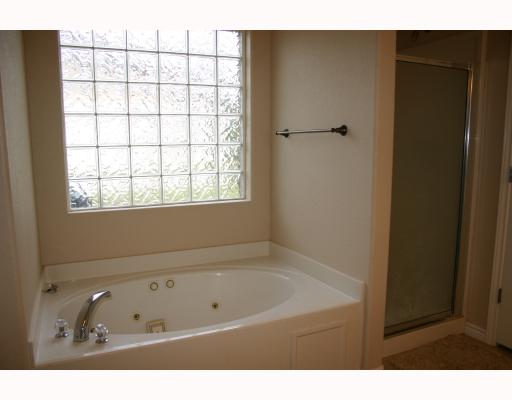1005 Purdue Road Corpus Christi, TX 78418 - Photo 5 of 10 a bathroom with a tub and a sink