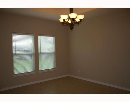 1005 Purdue Road Corpus Christi, TX 78418 - Photo 8 of 10 a view of a windows and chandelier in a room