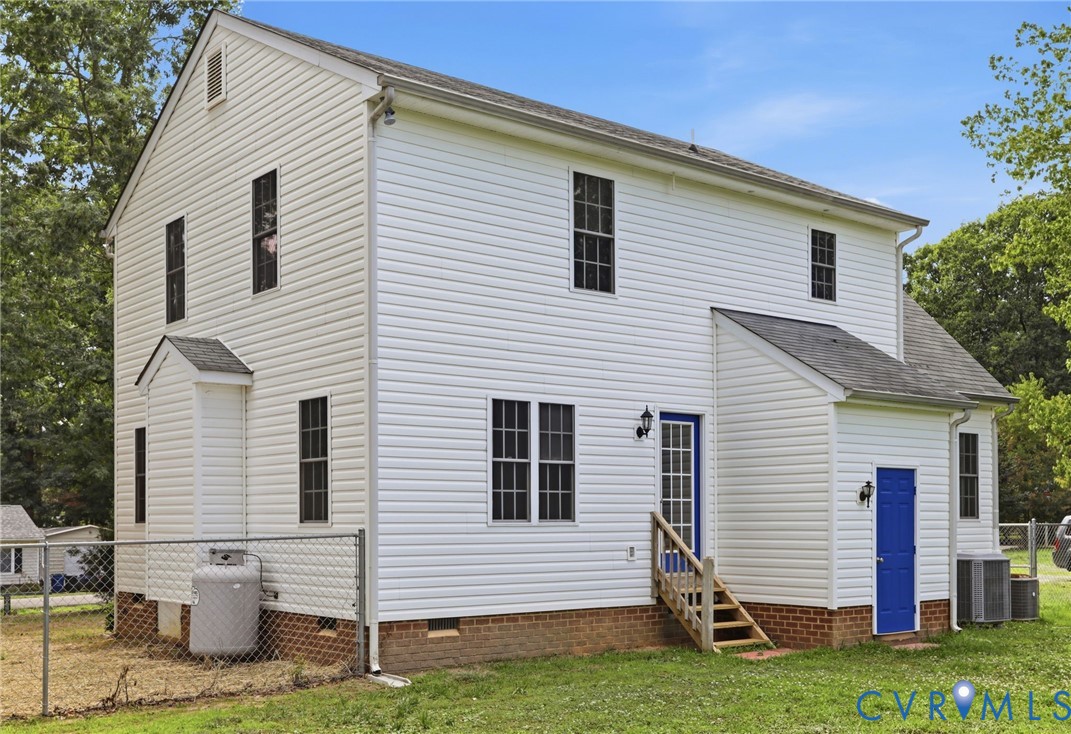 14420 Branding Iron Road Chesterfield, VA 23838 - Photo 38 of 50 White vinyl siding exterior with two distinct brig