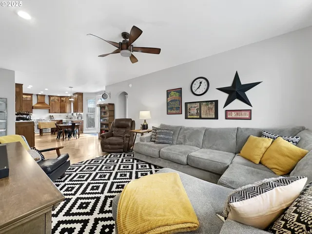 a living room with furniture and a rug
