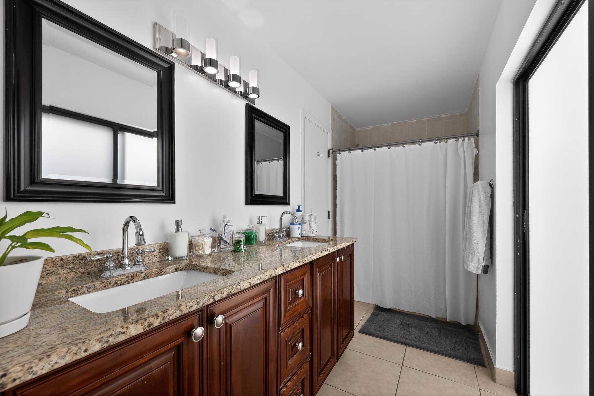 11423 Whisper Sound Drive Boca Raton, FL 33428 - Photo 38 of 39 32_11423_Whisper_Sound_Dr-Bathroom-0049