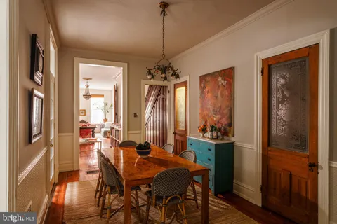 a kitchen with stainless steel appliances a sink and a stove