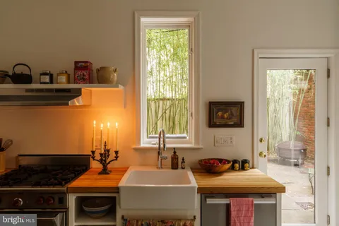 a view of a workspace with furniture