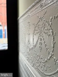 a kitchen with a refrigerator and a sink