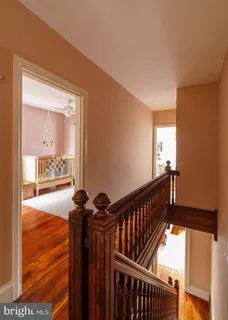 a bath room with a window and a bath tub