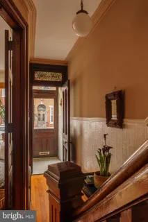 a front view of a house with wooden floor