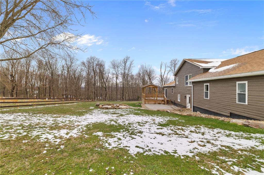 147 Fike Lane Addison, PA 15411 - Photo 7 of 50 a view of a house with a yard