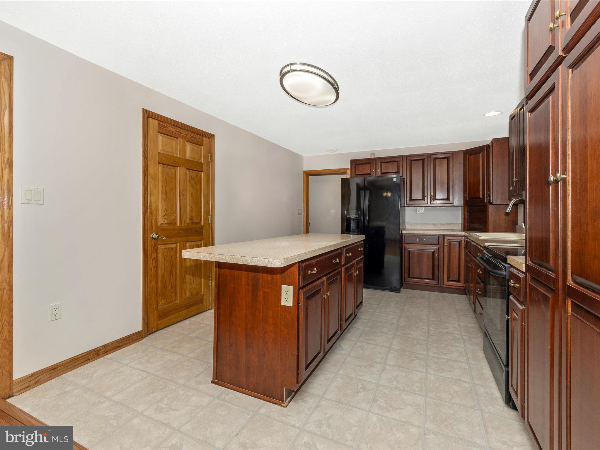 4439 John Draper Road Smithsburg, MD 21783 - Photo 16 of 63 a kitchen with stainless steel appliances granite countertop a stove a refrigerator and a sink