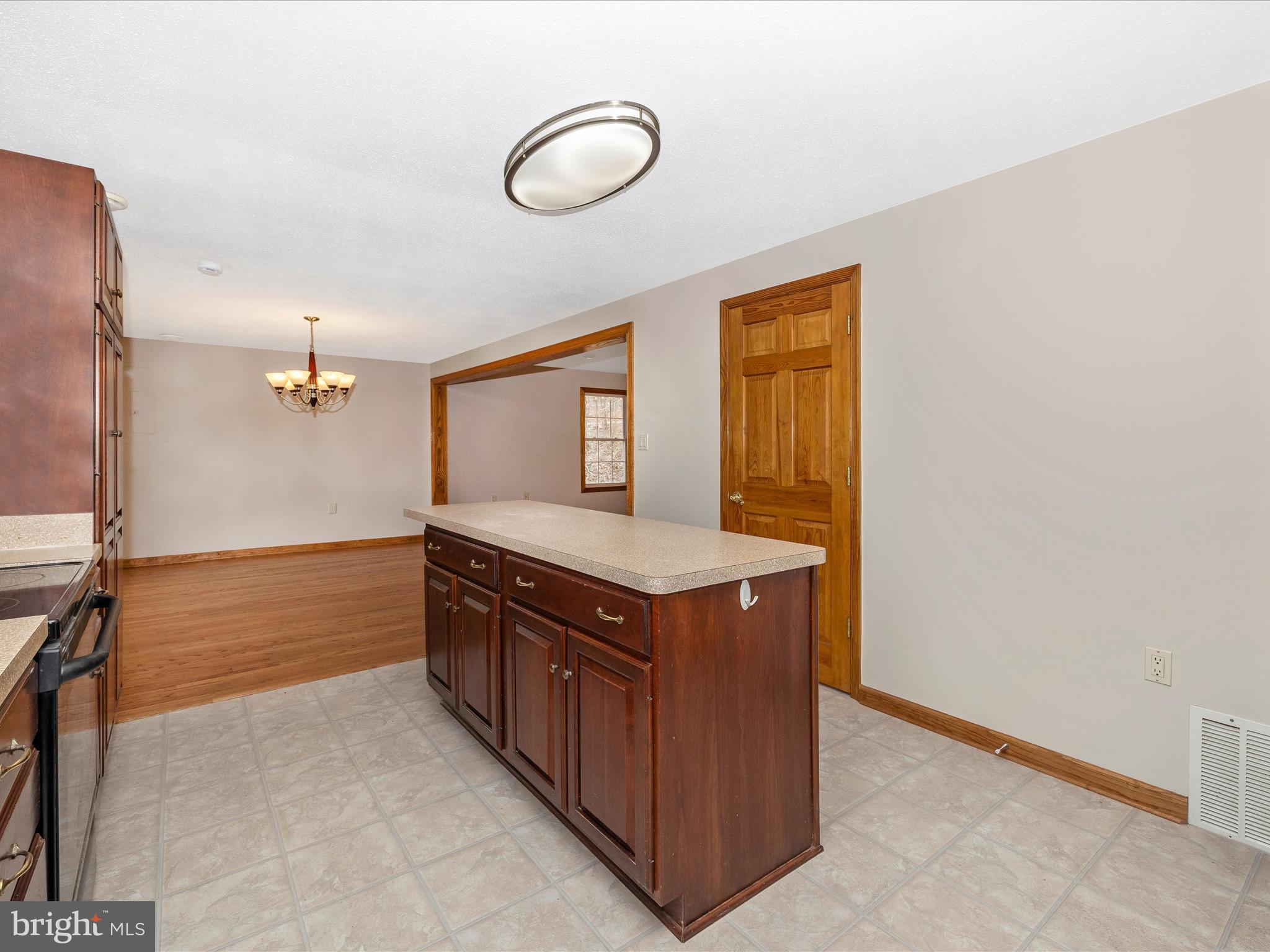 4439 John Draper Road Smithsburg, MD 21783 - Photo 18 of 63 a kitchen with a stove and a sink