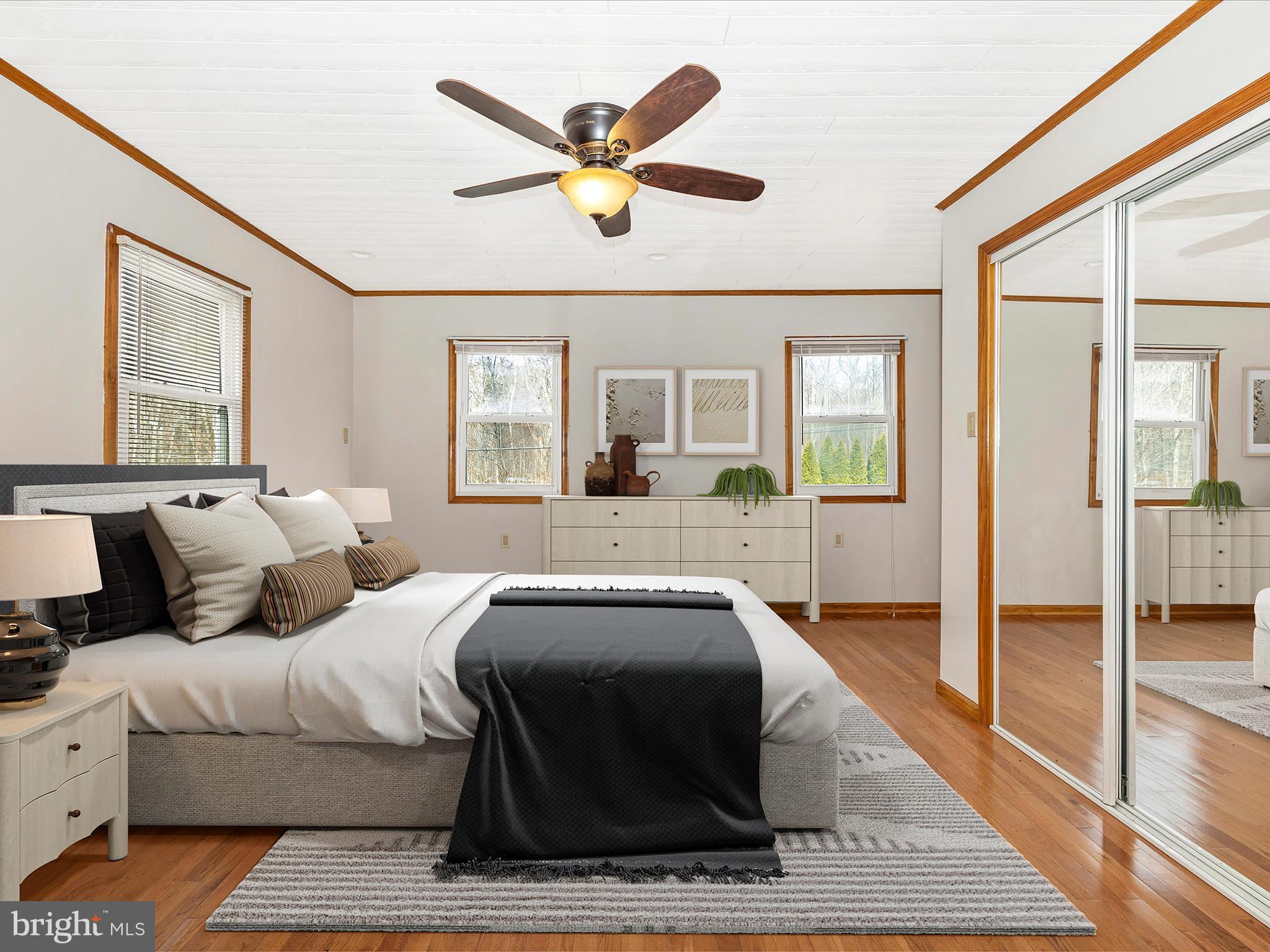 4439 John Draper Road Smithsburg, MD 21783 - Photo 28 of 63 a living room with a bed and glass door