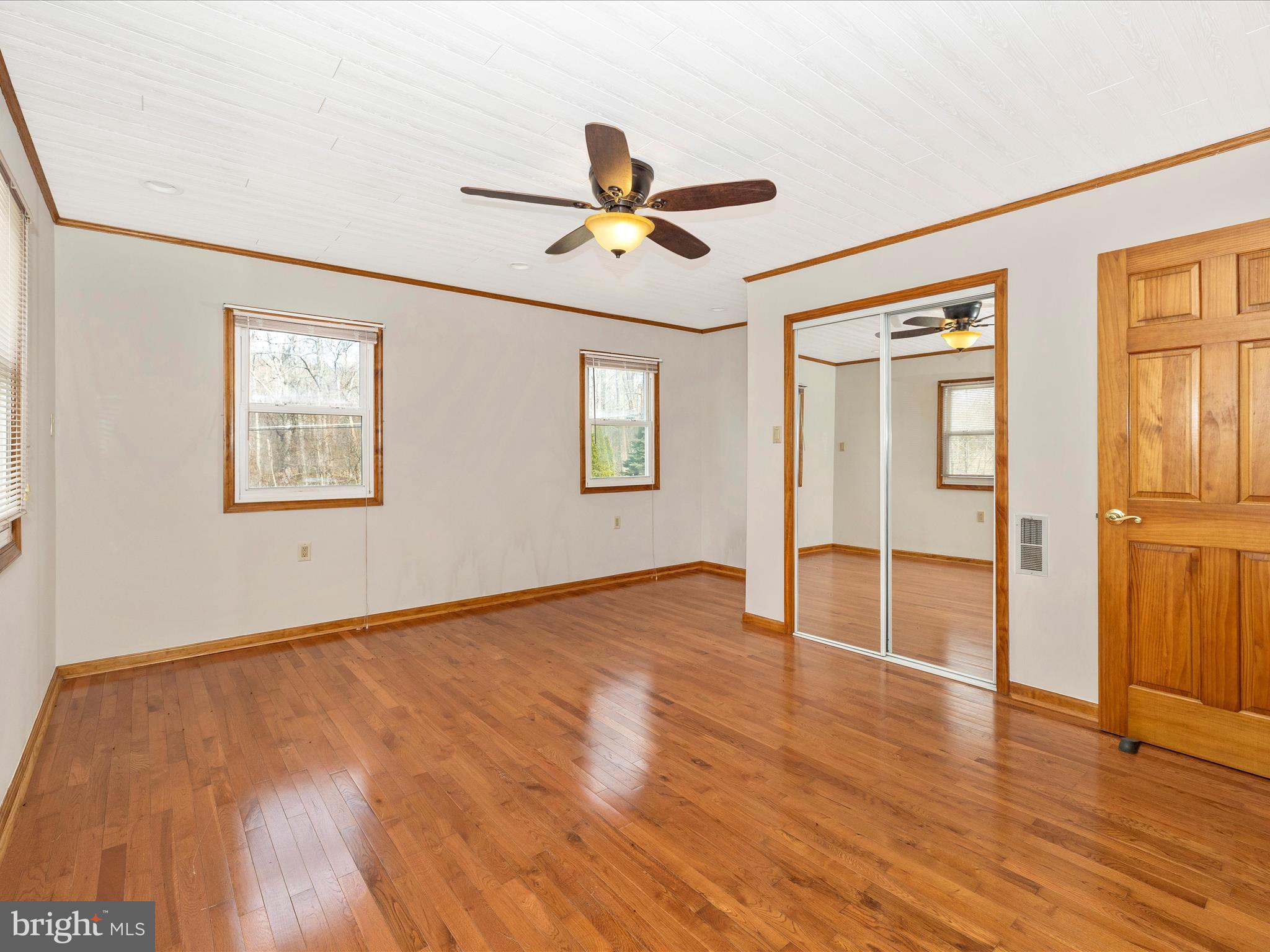 4439 John Draper Road Smithsburg, MD 21783 - Photo 31 of 63 a view of an empty room with window and wooden floor