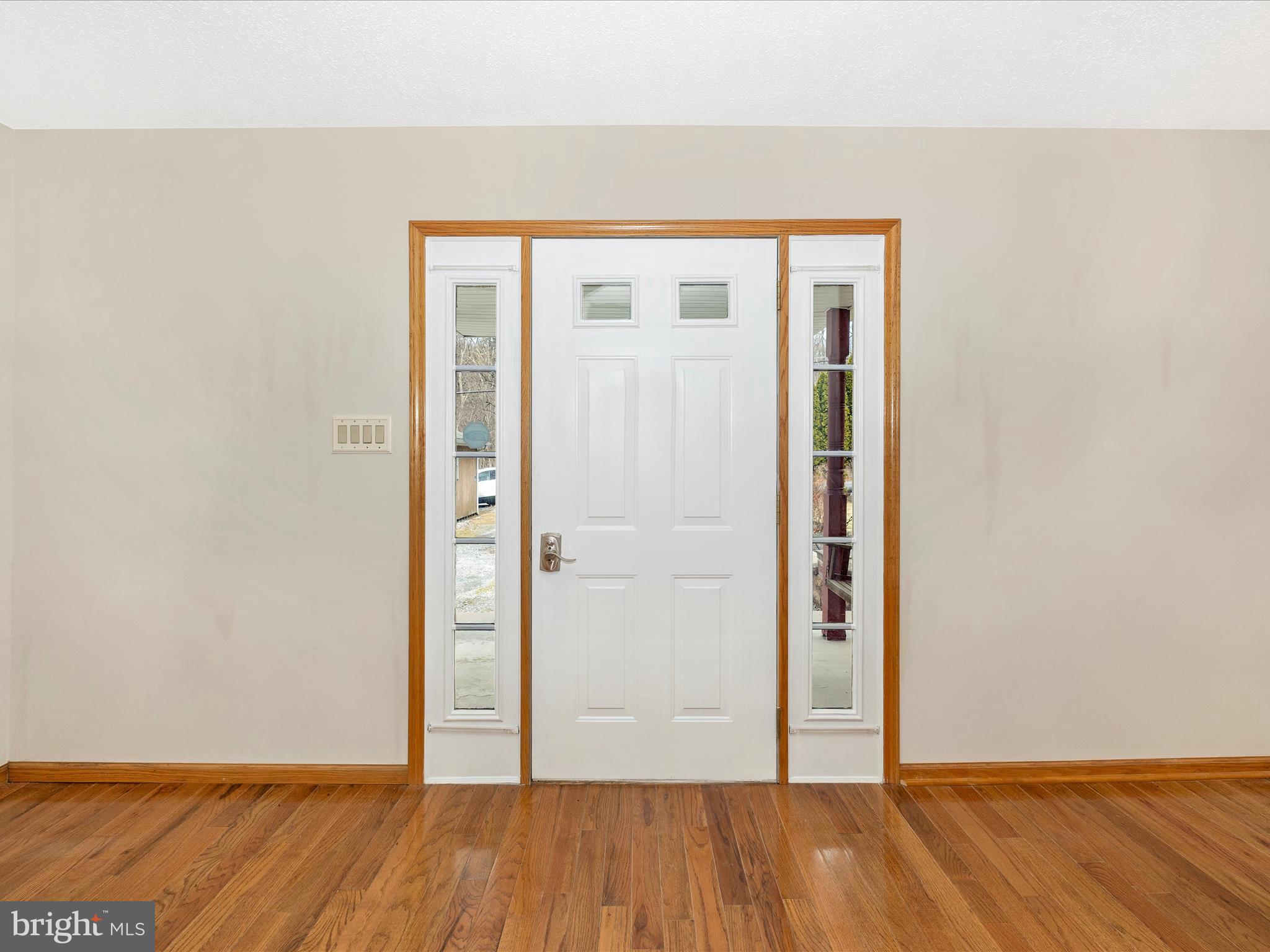 4439 John Draper Road Smithsburg, MD 21783 - Photo 7 of 63 an empty room with wooden floor and closet