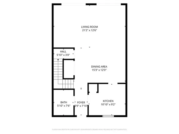 a picture of a bench in front of a building