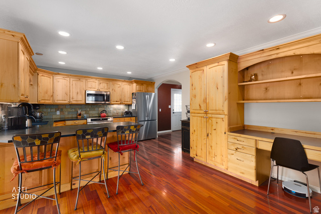 16535 South Redwood Road Riverton, UT 84065 - Photo 19 of 59 Recessed lighting illuminates the wood-finish flooring