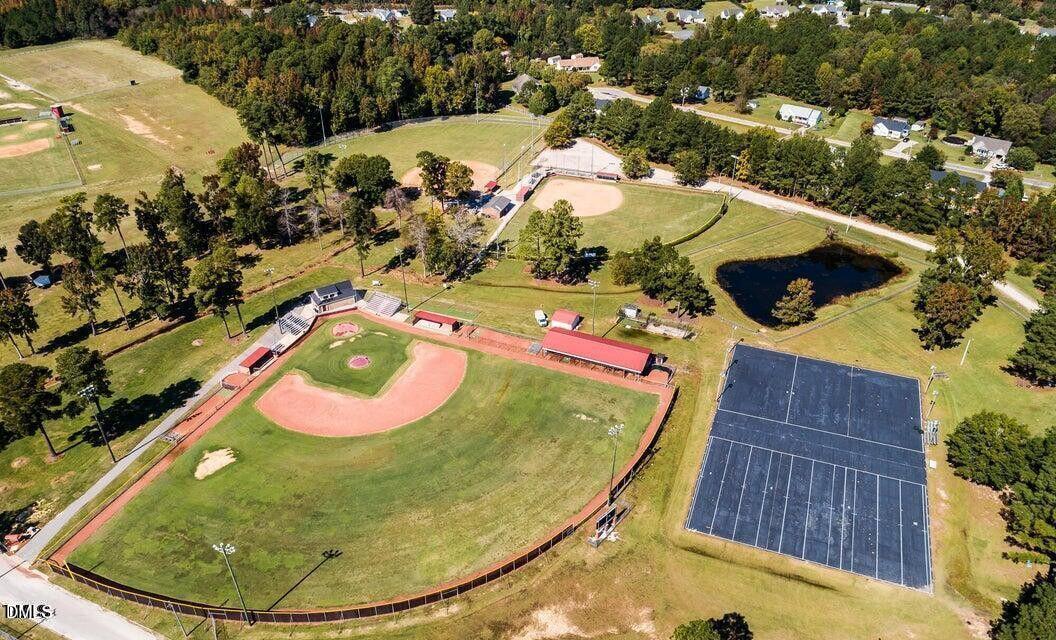 247 Blue Butterfly Drive Angier, NC 27501 - Photo 31 of 41 an aerial view of a swimming pool