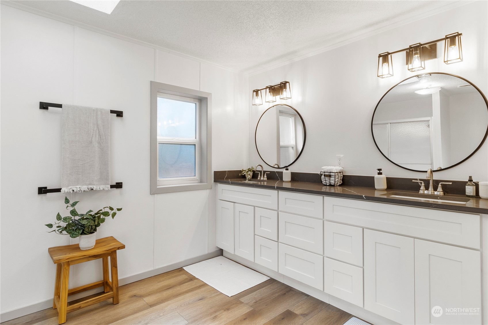 18441 Elaine Court Southwest Rochester, WA 98579 - Photo 16 of 30 a bathroom with 2 sink and a mirror