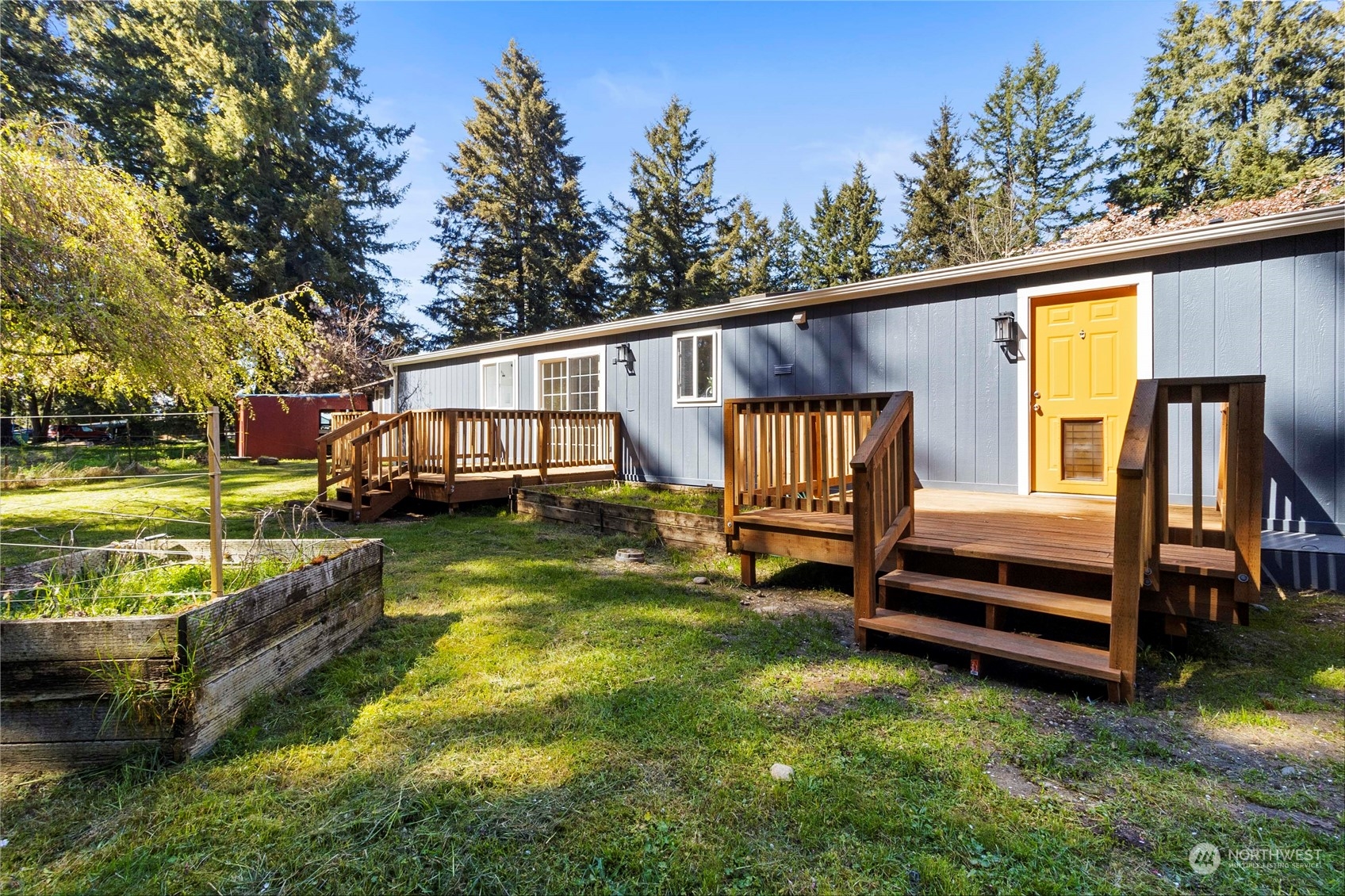 18441 Elaine Court Southwest Rochester, WA 98579 - Photo 23 of 30 a view of a house with a yard
