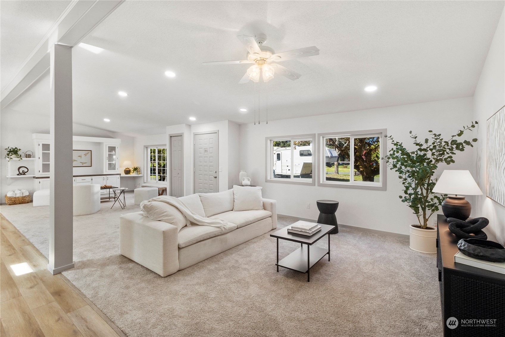 18441 Elaine Court Southwest Rochester, WA 98579 - Photo 5 of 30 a living room with furniture and a chandelier