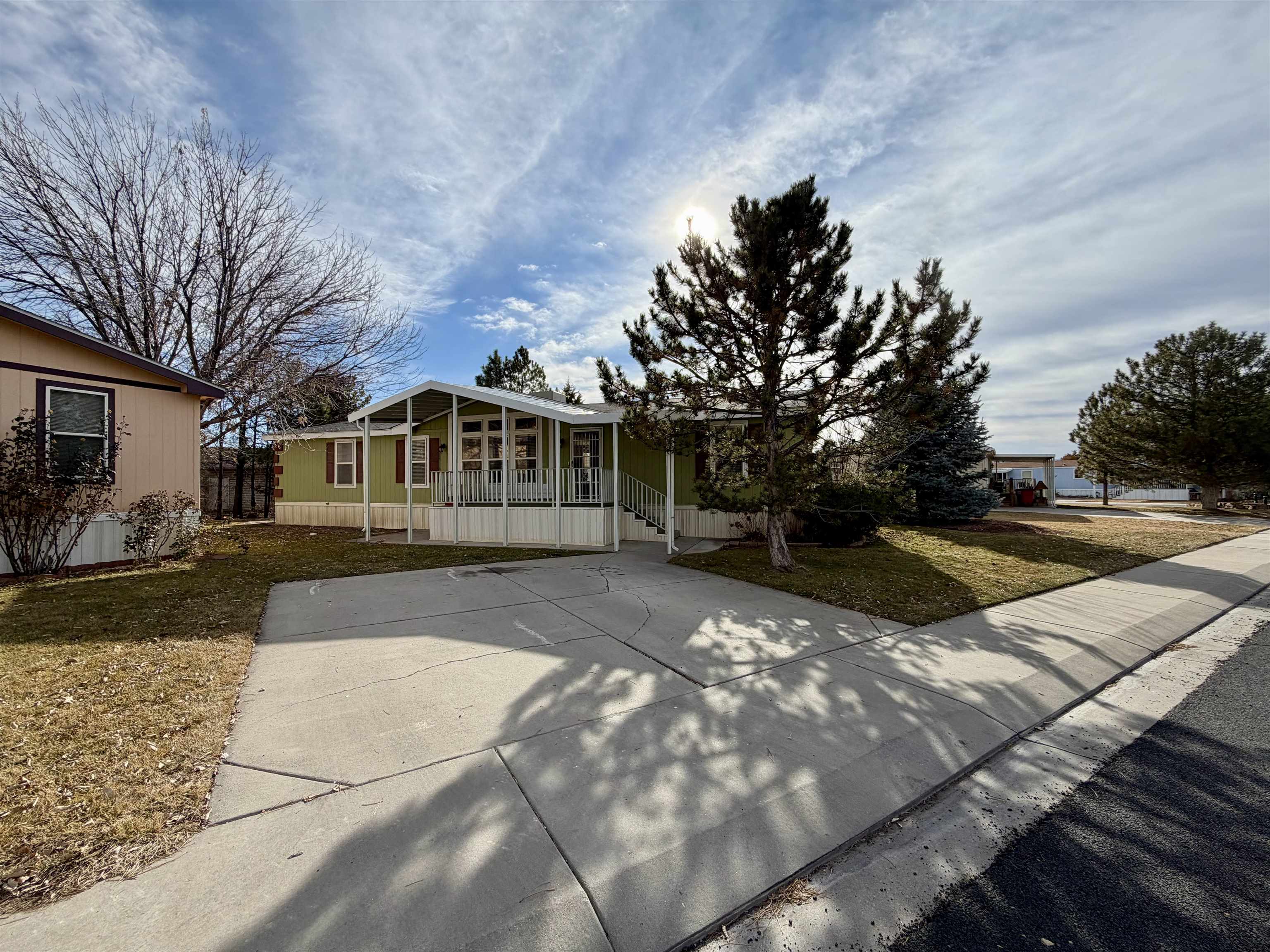 435 32 Road, Unit 480 Clifton, CO 81520 - Photo 1 of 23 a view of a house with a yard