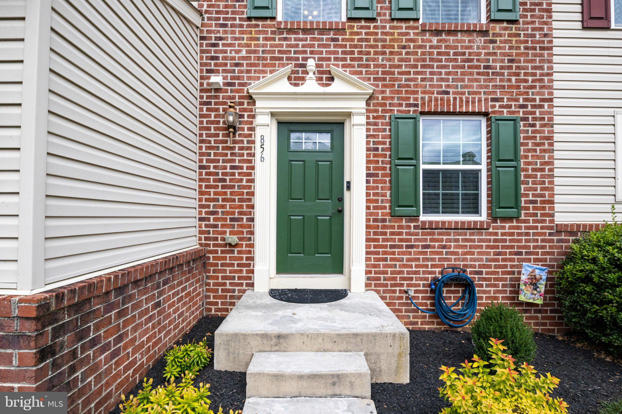 856 Countryside Road Seven Valleys, PA 17360 - Photo 4 of 47 Charming entry with green accents.