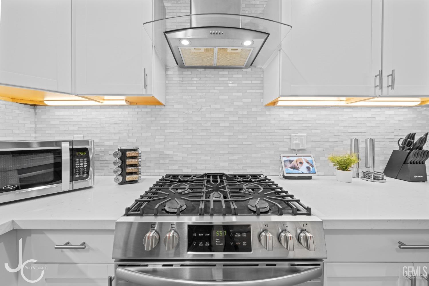 Undisclosed Address Bakersfield, CA 93307 - Photo 14 of 31 a close view of a stove top oven