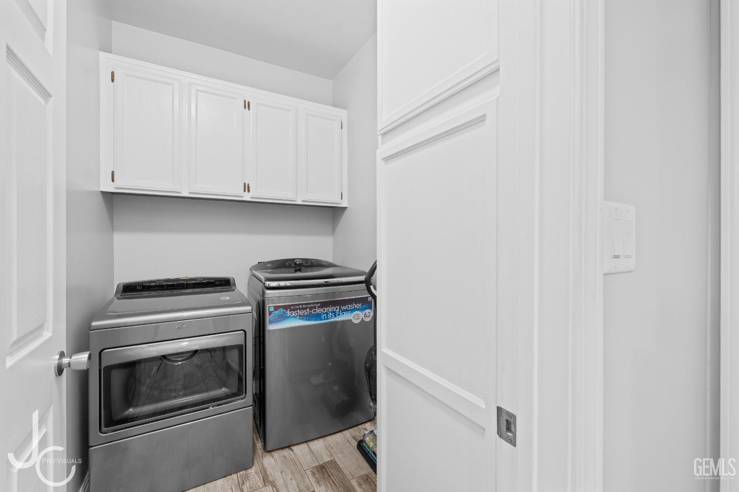Undisclosed Address Bakersfield, CA 93307 - Photo 16 of 31 a kitchen with a stove and white cabinet