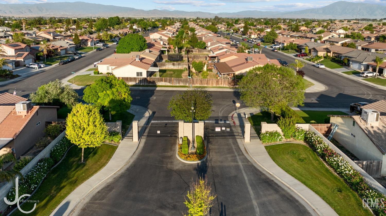 Undisclosed Address Bakersfield, CA 93307 - Photo 31 of 31 an aerial view of a house with a swimming pool