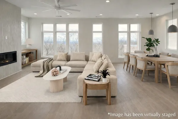 a room with window and a ceiling fan