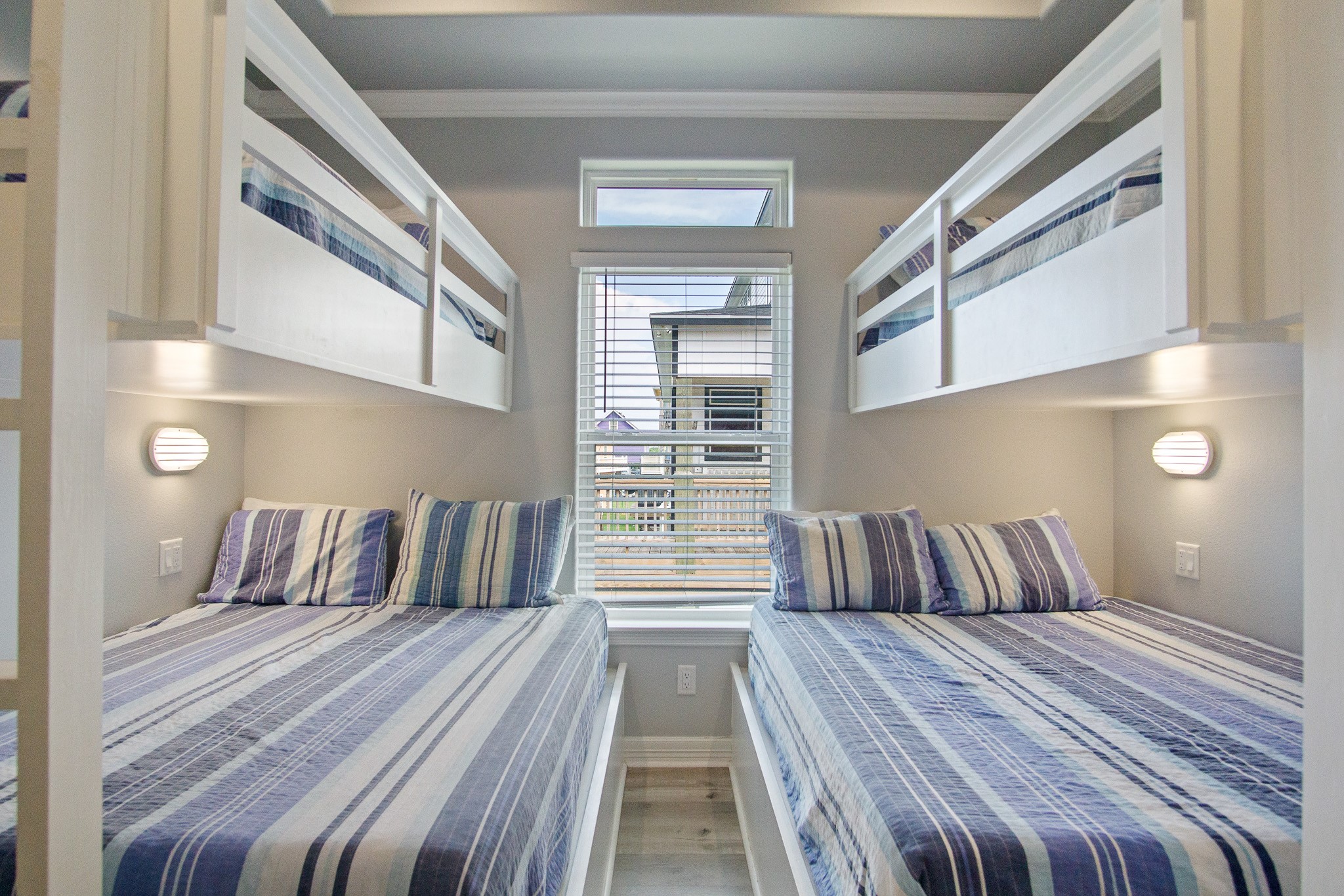 1819 Redfish Lane Crystal Beach, TX 77650 - Photo 17 of 34 a bedroom with a bed and a night stand