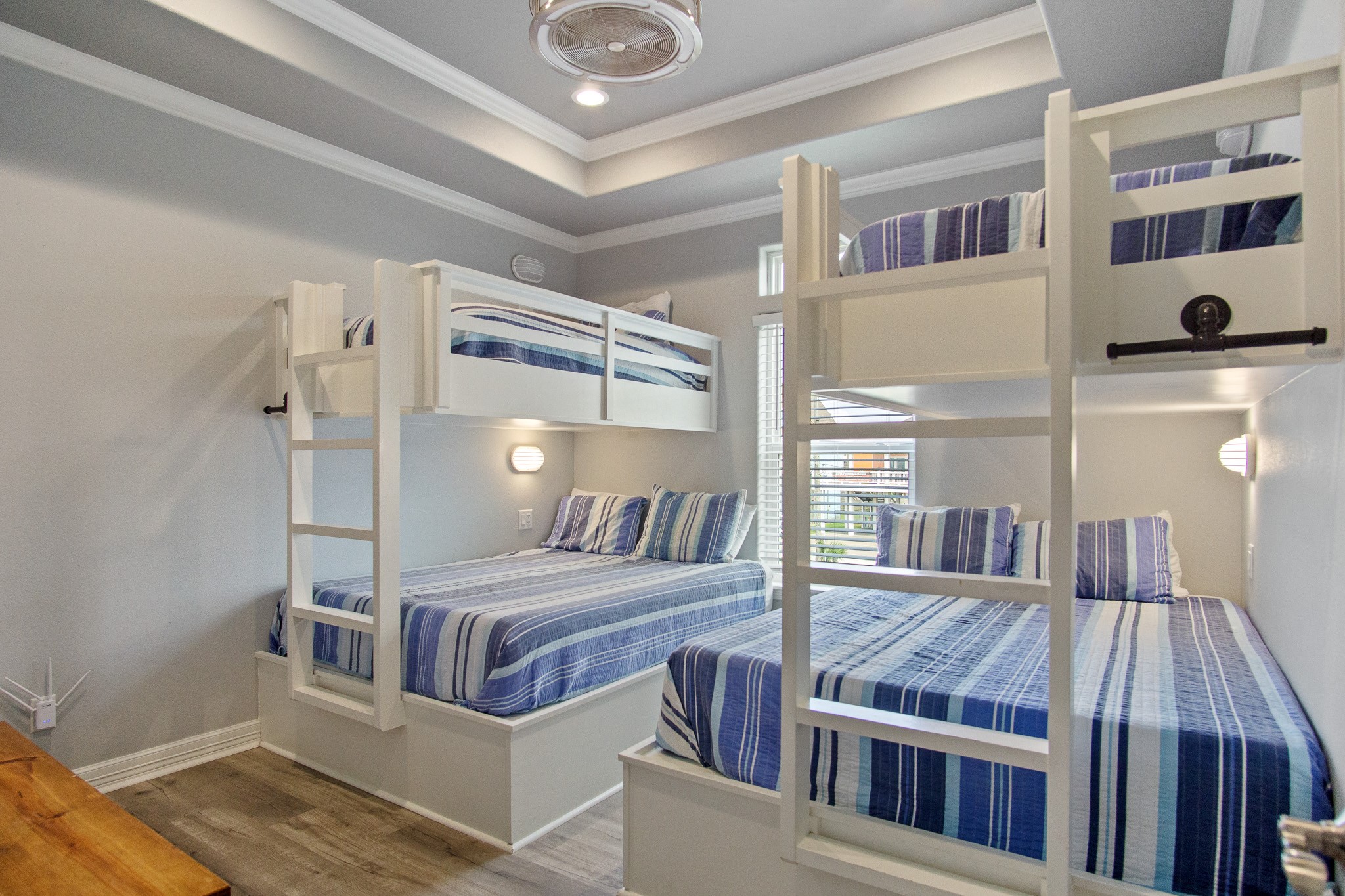 1819 Redfish Lane Crystal Beach, TX 77650 - Photo 18 of 34 a bedroom with a bed and a mirror