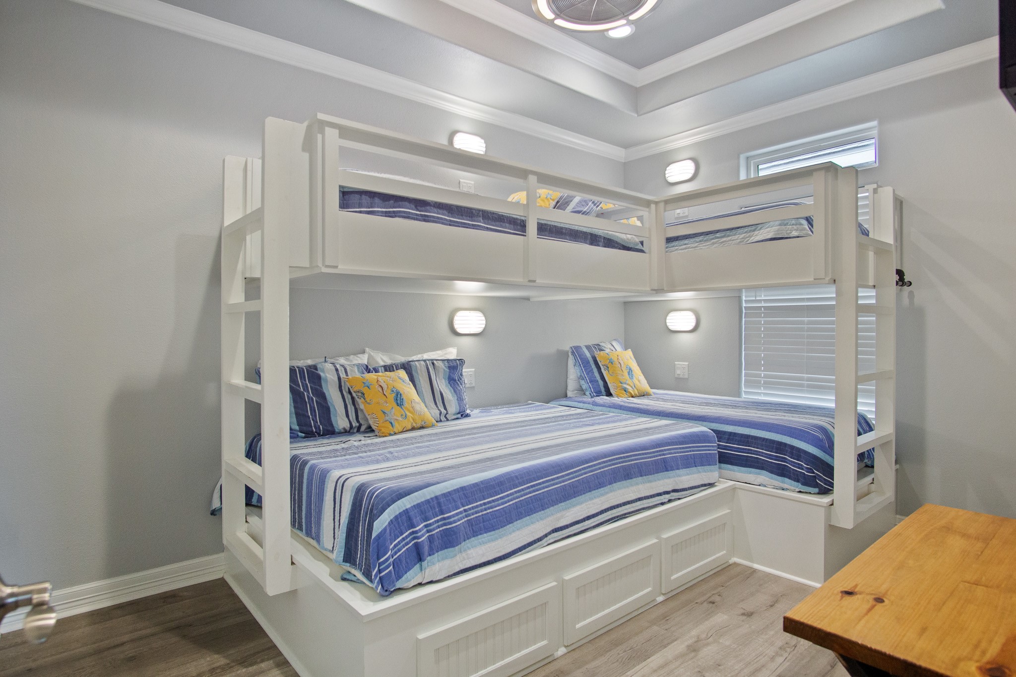 1819 Redfish Lane Crystal Beach, TX 77650 - Photo 20 of 34 a bedroom with a bed and wooden floor