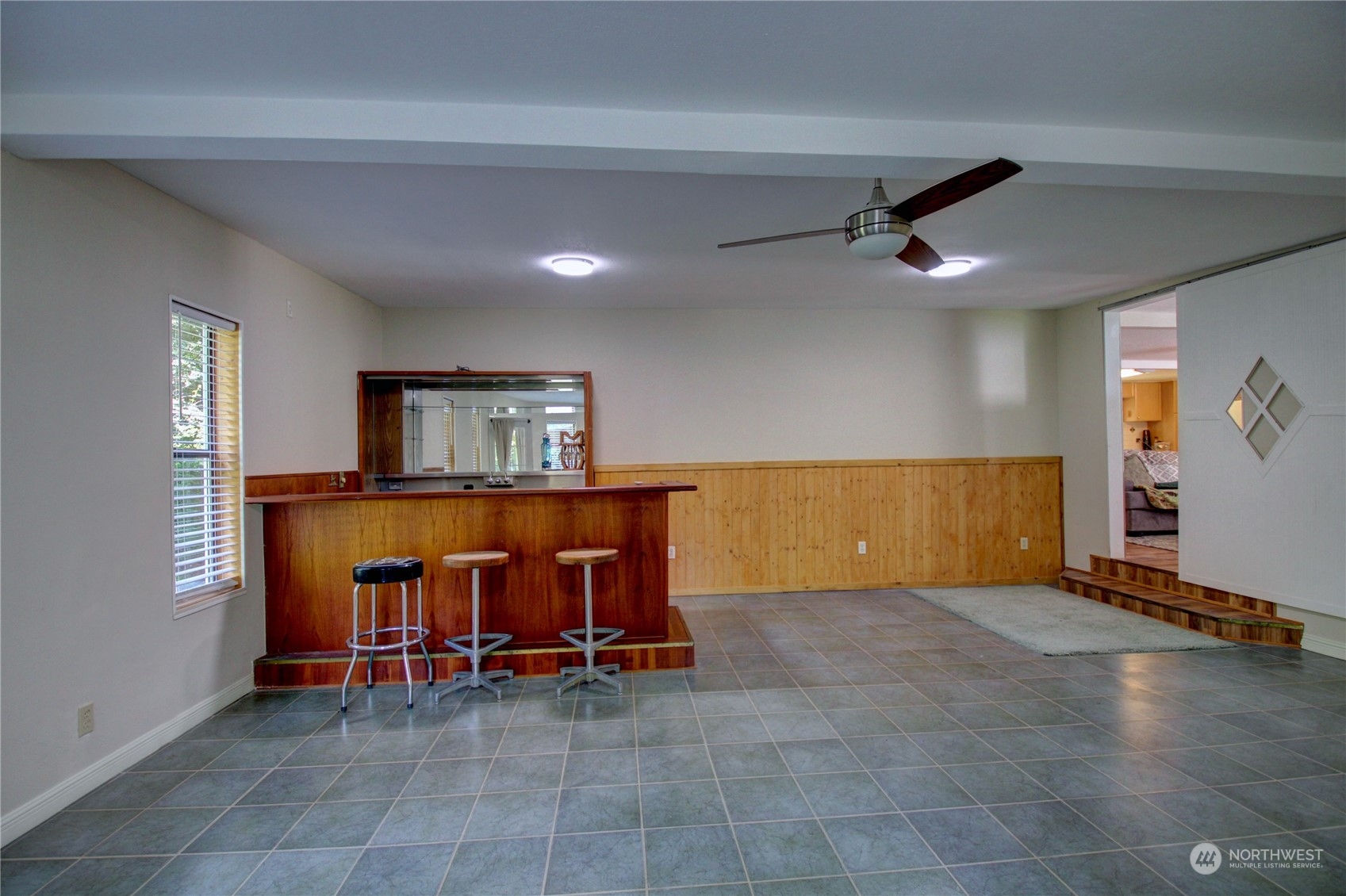 16105 OK Mill Road Snohomish, WA 98290 - Photo 15 of 34 a view of a livingroom with furniture and a ceiling fan