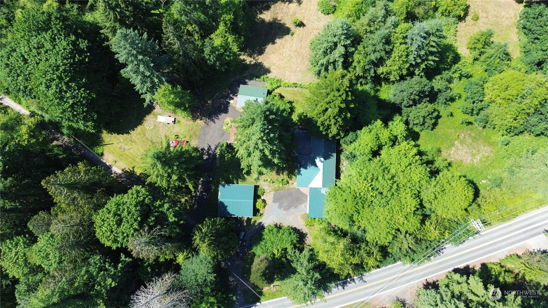 16105 OK Mill Road Snohomish, WA 98290 - Photo 2 of 34 an aerial view of a house with a yard