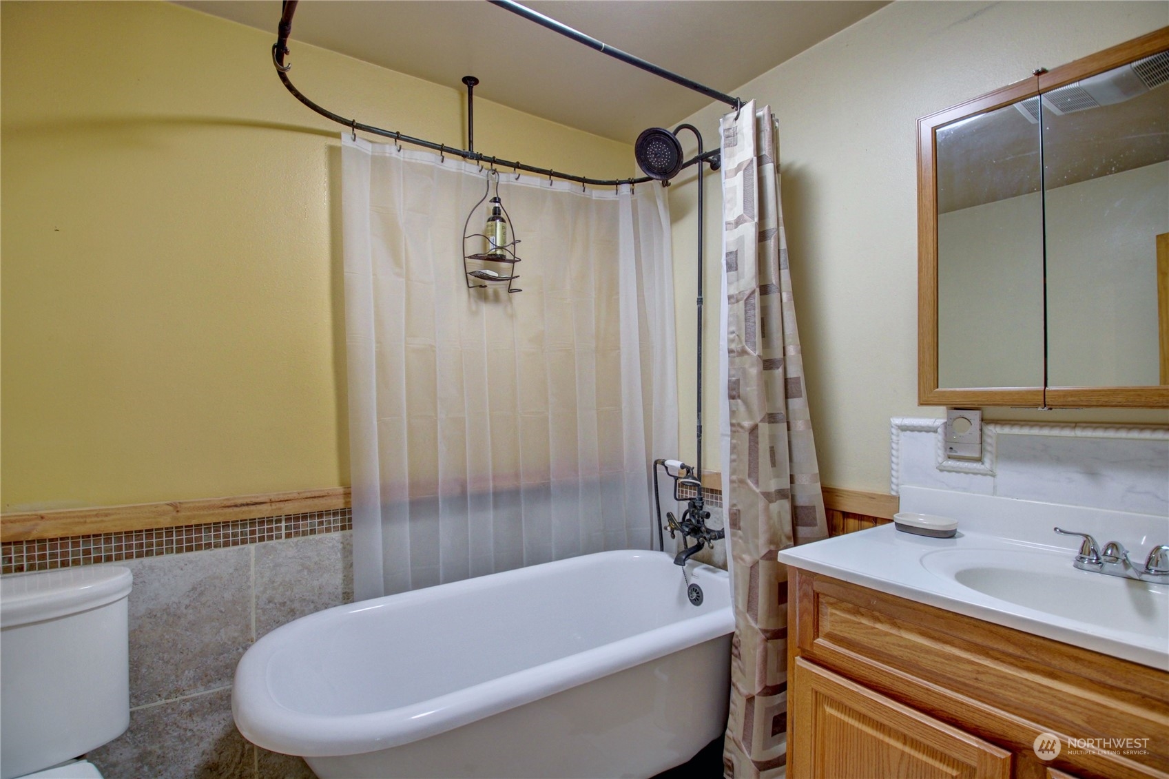 16105 OK Mill Road Snohomish, WA 98290 - Photo 22 of 34 a bathroom with a sink toilet and shower
