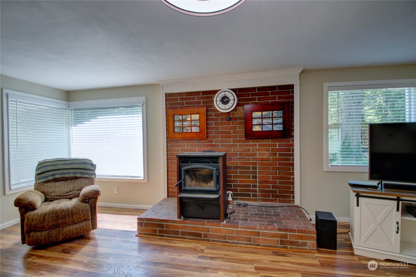 16105 OK Mill Road Snohomish, WA 98290 - Photo 5 of 34 a living room with furniture and a fireplace