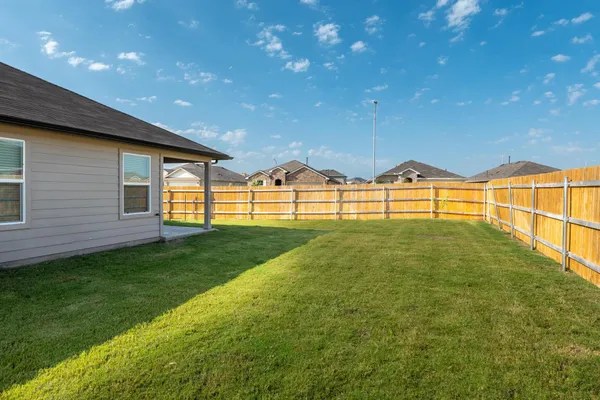 a house view with a outdoor space